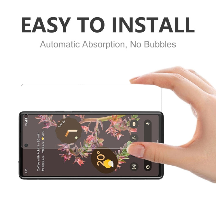 Tempered glass screen protector film being applied to phone screen, no-bubble fit