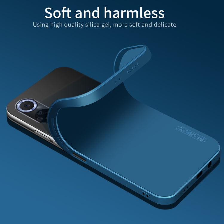 Blue liquid silicone TPU phone case with raised edges and precise port cutouts