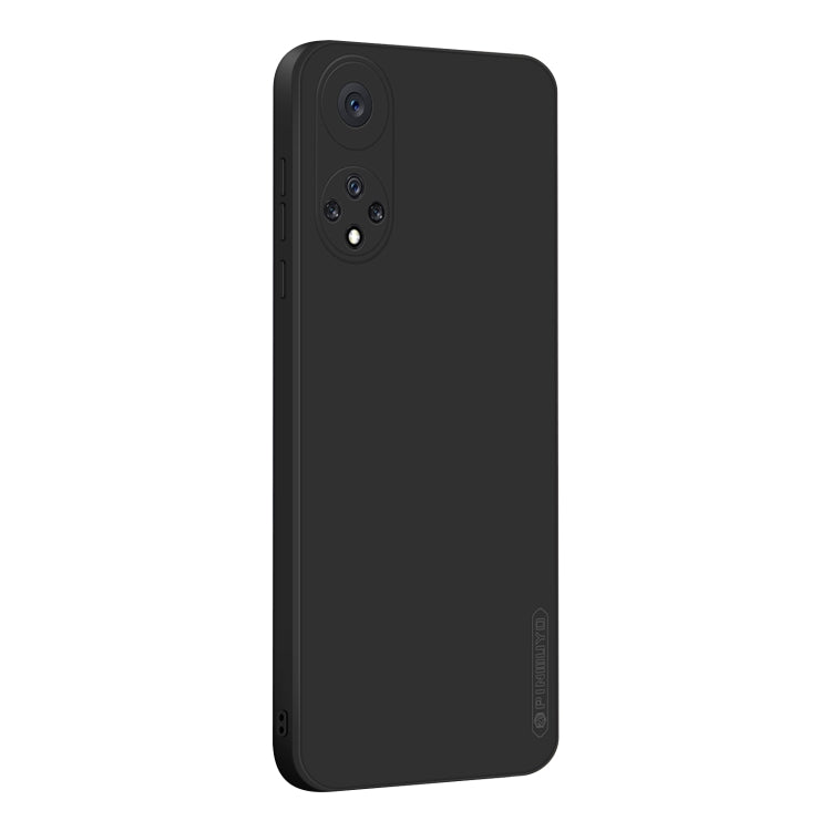 Black liquid silicone TPU phone case with triple camera cutout and slim raised back