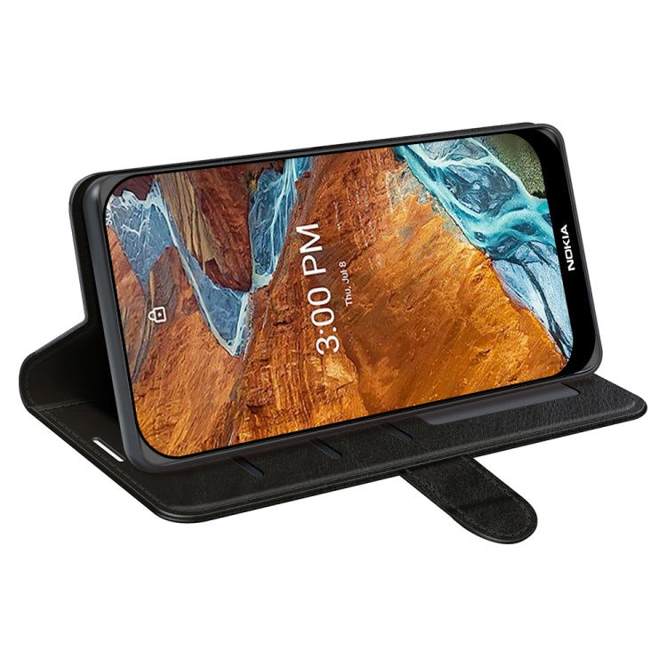 Black textured flip phone case used as a horizontal stand with open front