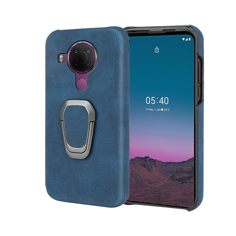 Blue PU phone case with ring holder, worn with phone showing camera cutout and buttons