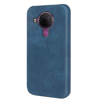 Blue PU phone case with ring holder, camera cutout on back