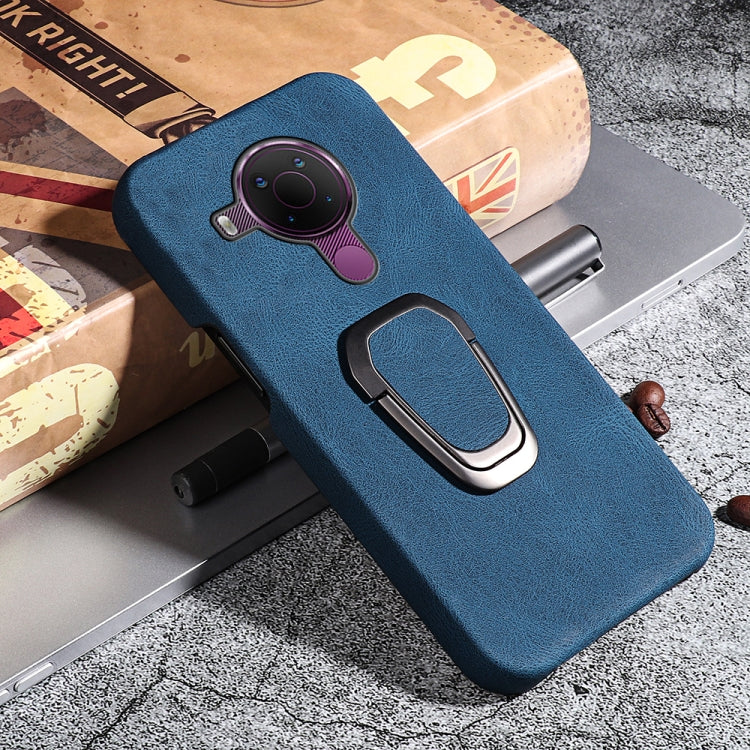 Blue PU phone case with ring holder, camera cutout and metal ring loop