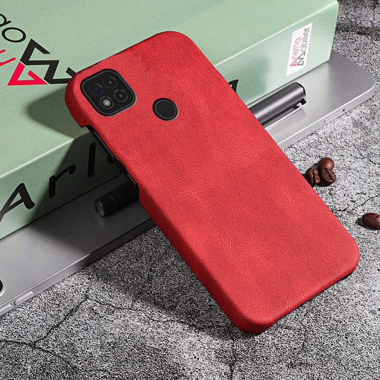 Red PU phone case with ring holder and camera cutout on angled phone