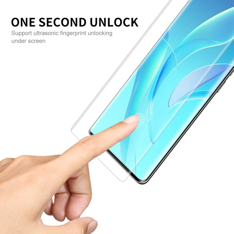 Curved edge screen protector with hand applying the film to the phone display