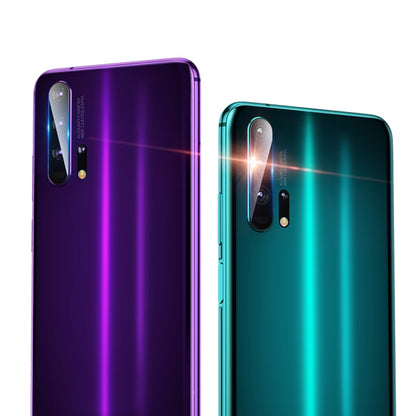 Rear camera lens tempered glass protectors on purple and teal phones