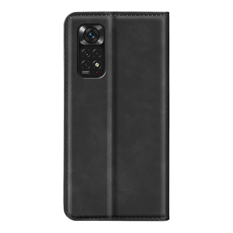 Black leather flip phone case back, with camera and speaker cutouts