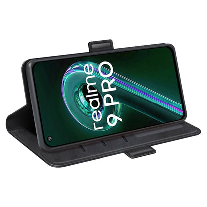 Black leather folio phone case with fold-out stand and side magnetic strap.