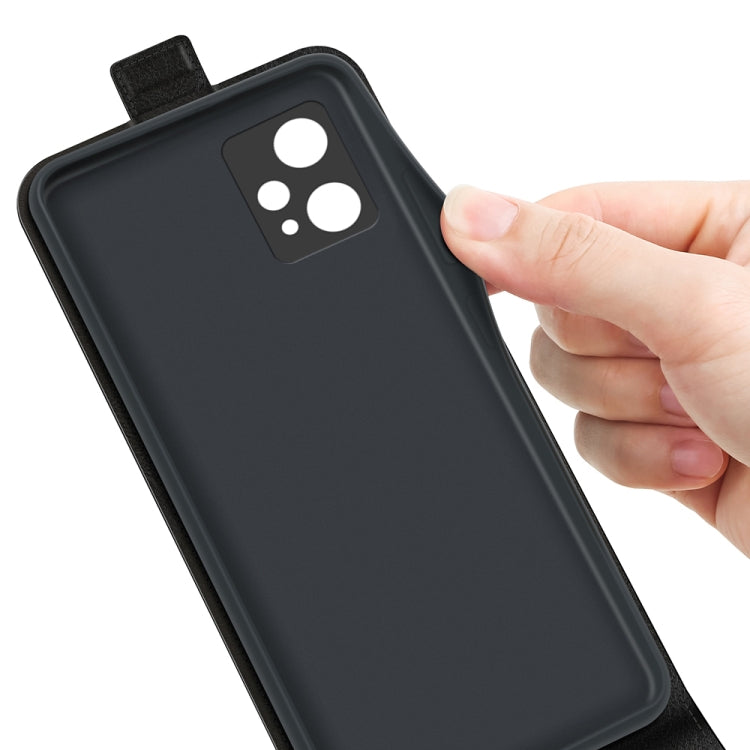 Black leather flip phone case being fitted onto a phone by hand