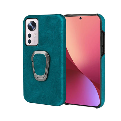 Cyan PU phone case with ring holder and camera cutouts for phone