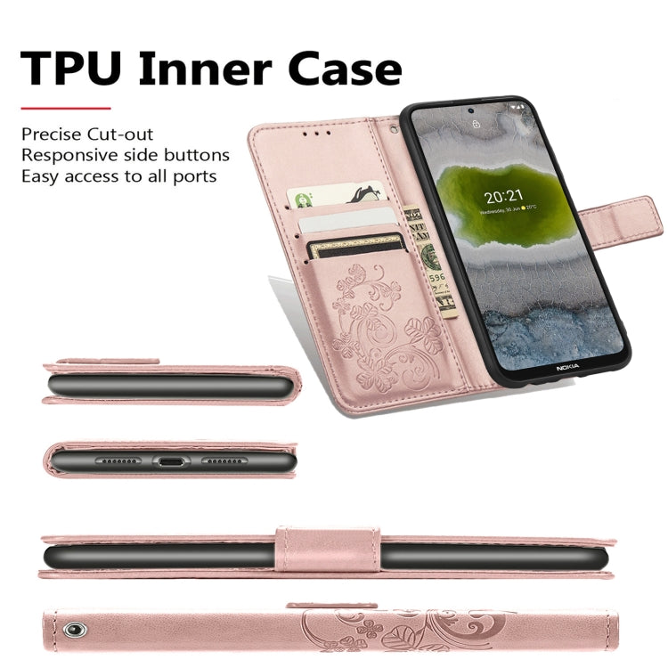 Pink embossed leather wallet phone case with flap, card slots, and cutout ports view