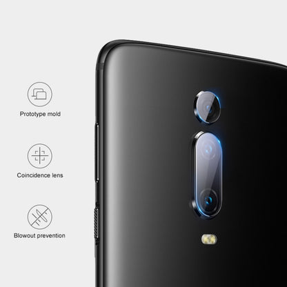 Rear camera lens film on black phone, cutouts aligned over upper and lower lenses