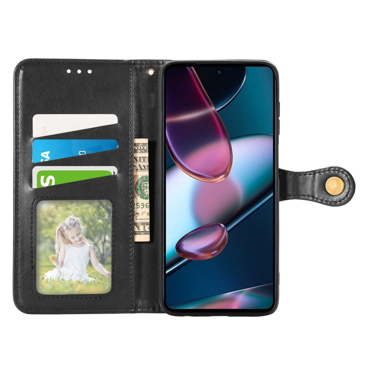 Black leather wallet phone case with card slot and fold-over cover