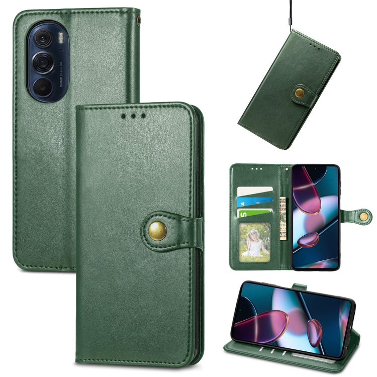 Green leather flip phone case with gold buckle, card holder, and stand