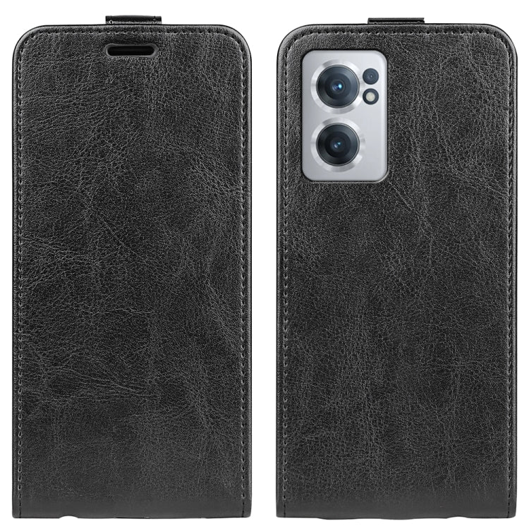 Black textured leather flip phone case with vertical fold and camera cutout