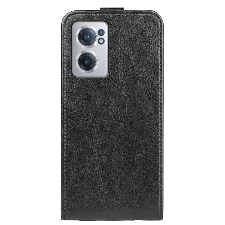 Black textured leather flip phone case with camera cutout and vertical stance