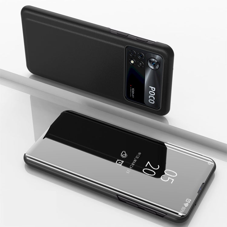 Black horizontal flip mirror case with holder; phone back and open reflective front panel.