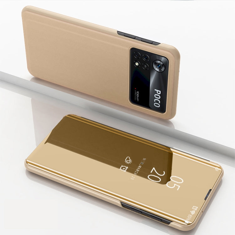 Gold horizontal flip mirror case with holder; phone back and open reflective front panel.