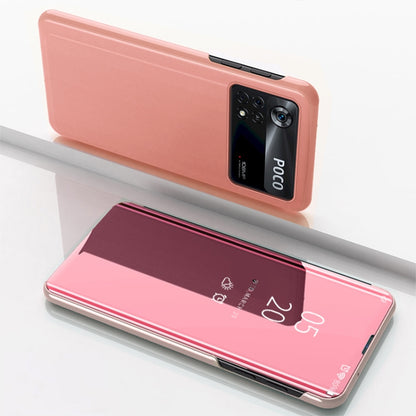 Rose gold horizontal flip mirror case with holder; phone back and open reflective front panel.