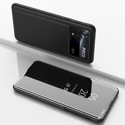 Black horizontal flip mirror case with holder; phone back and open reflective front panel.