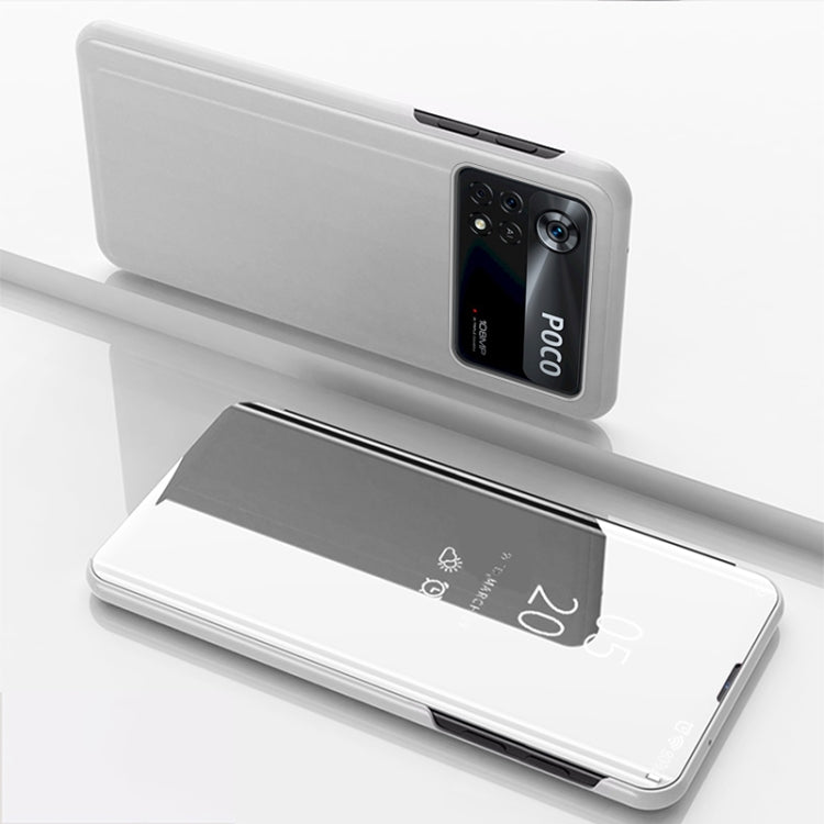 Silver horizontal flip mirror case with holder; phone back and open reflective front panel.