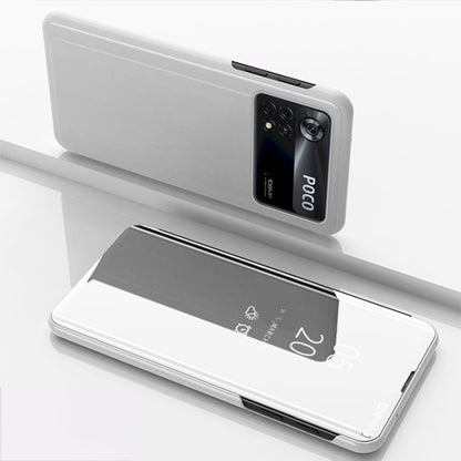 Silver horizontal flip mirror case with holder; phone back and open reflective front panel.