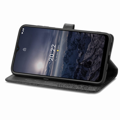 Black embossed mandala flip phone case with stand-up viewing position