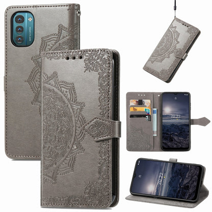 Gray embossed mandala flip leather phone case with magnetic closure and card slots