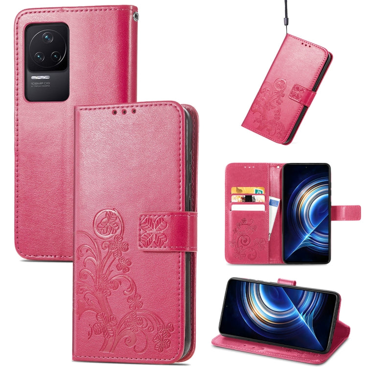 Magenta embossed leather wallet phone case with floral pattern and clasp buckle