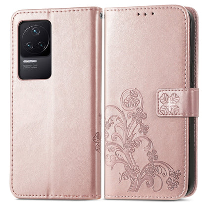 Rose pink embossed leather wallet phone case, floral cut-out design, clasp closure