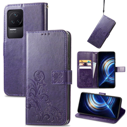 Purple leather folio phone case with embossed floral pattern, clasp buckle and card slots