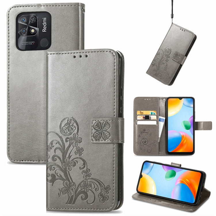 Gray leather folio phone case with embossed floral pattern, clasp buckle and card slots