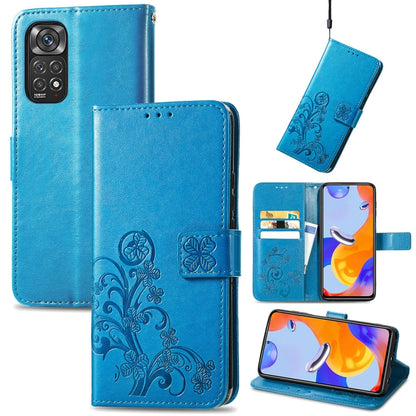 Blue leather folio phone case with embossed floral pattern, clasp buckle and card slots