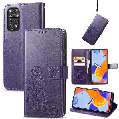 Purple leather folio phone case with embossed floral pattern, clasp buckle and card slots