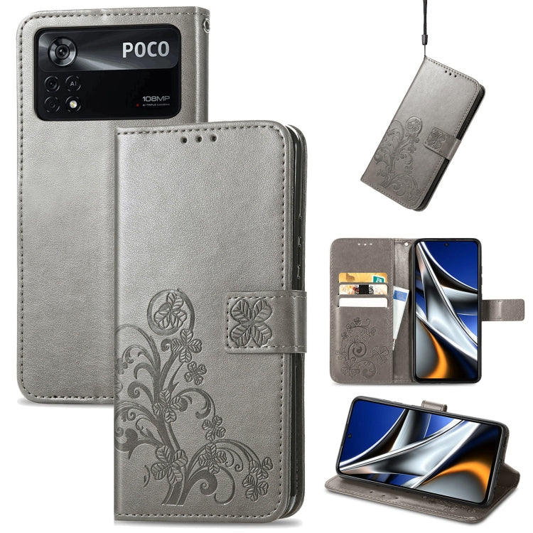 Gray embossed leather phone case with four-leaf clasp buckle, card slots, cover flap