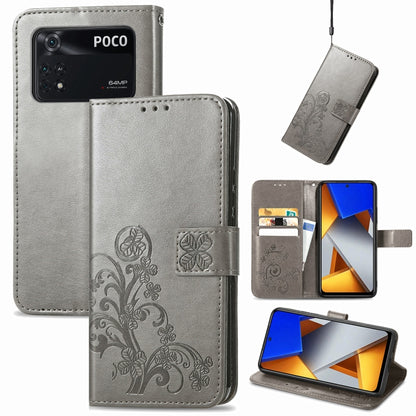 Gray embossed leather phone case with four-leaf clasp buckle, card slots and stand