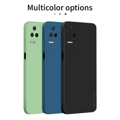 Multicolor liquid silicone TPU phone cases: black, blue, and green with camera cutouts