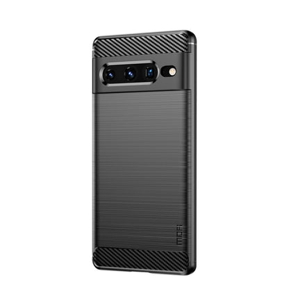 Dark gray phone case with carbon-fiber style top and textured grip back