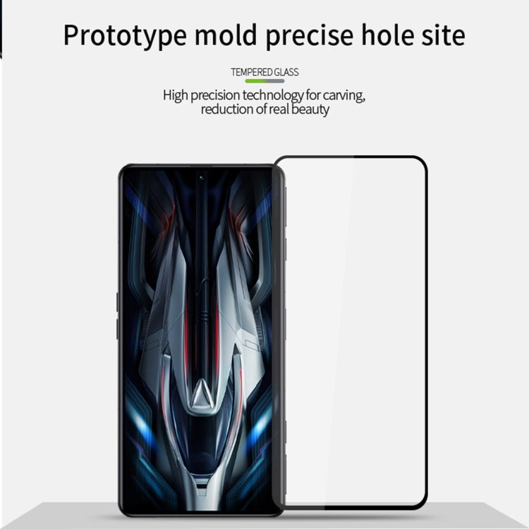 Tempered glass screen protector aligned on smartphone screen, full coverage