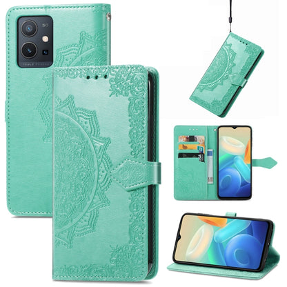 Mint green embossed mandala leather flip phone case with card slot and magnetic strap