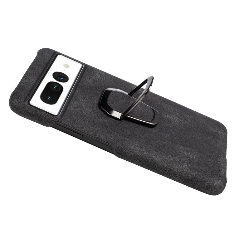 Black PU phone case with metal ring holder, angled view with camera cutouts
