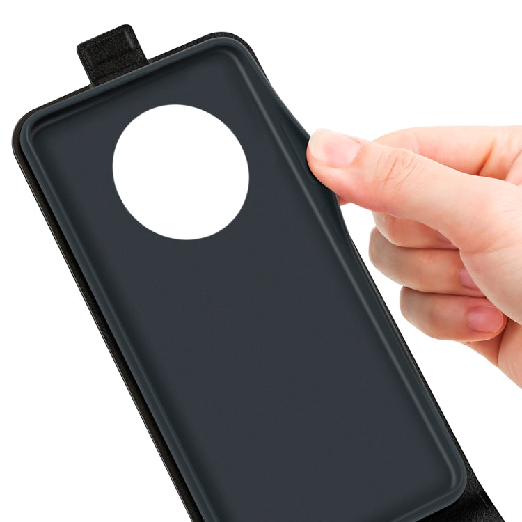 Dark leather phone case back with circular camera cutout; removable strap visible