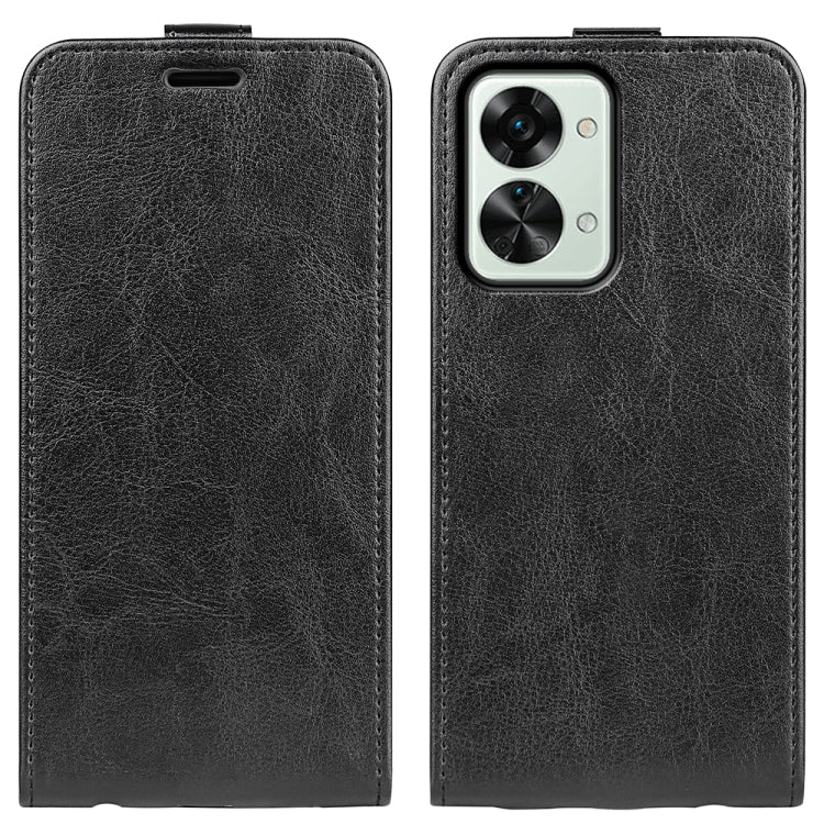 Black textured leather vertical flip phone case with camera cutout and top port openings.