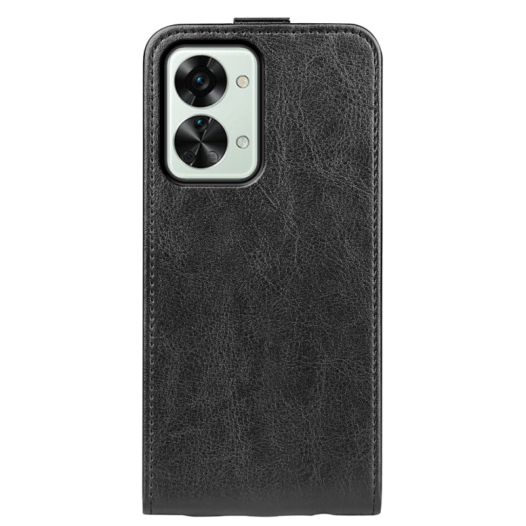 Black textured leather vertical flip phone case back view with camera cutout.