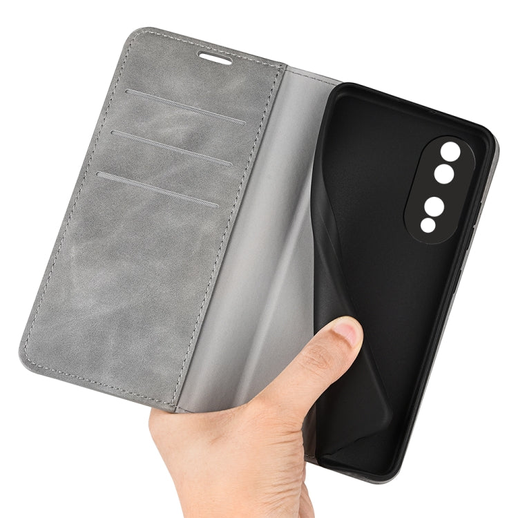 Grey leather-style flip phone case with inner card slots and camera opening