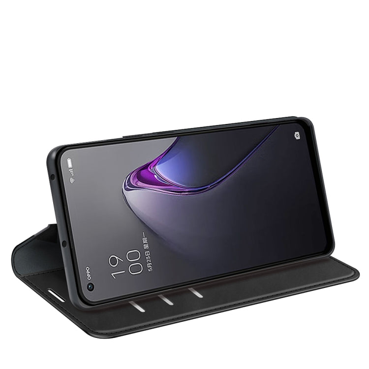 Black leather magnetic flip phone case opened as a stand