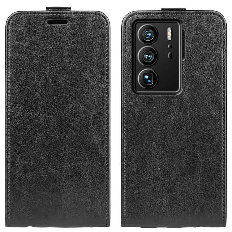 Black textured leather vertical flip phone case with camera cutout and speaker openings