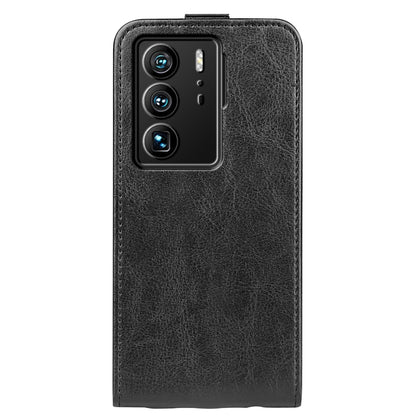 Black textured leather vertical flip phone case with camera cutout on back