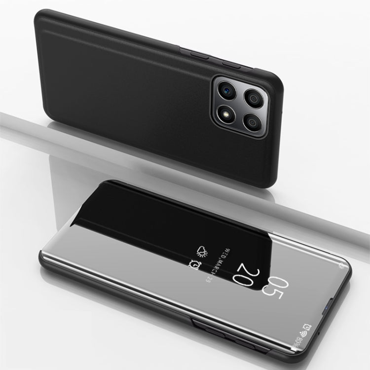 Black horizontal flip leather phone case with mirrored front and quad camera cutouts