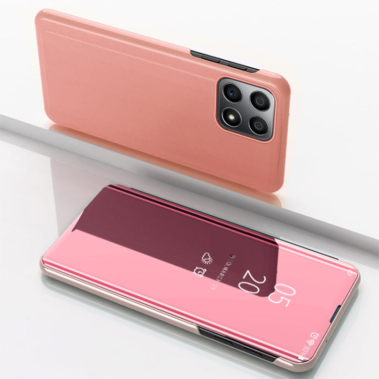 Plated mirror horizontal flip leather phone case in rose pink, with camera cutouts